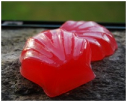 Camellia soap in the shape of a scallop shell